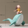 Girl with whale