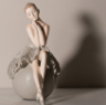 Ballerina girl seating ball
