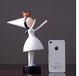 Small girl with orange bird